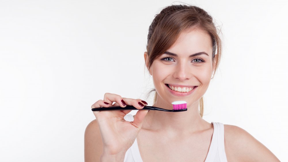 Woman brushing her teeth