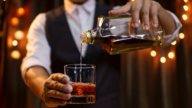 Bartender pouring drink