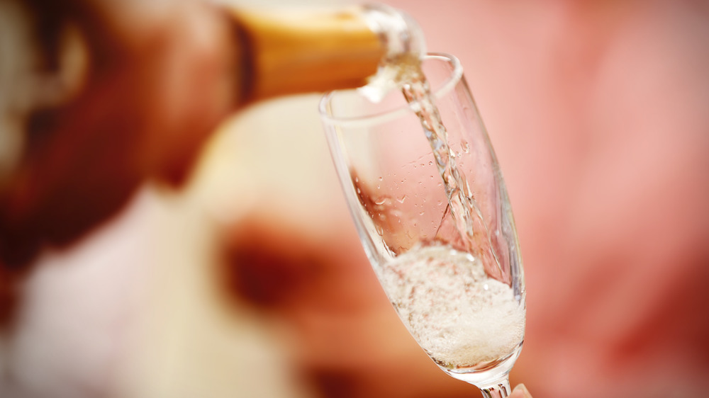 Champagne being poured into a glass