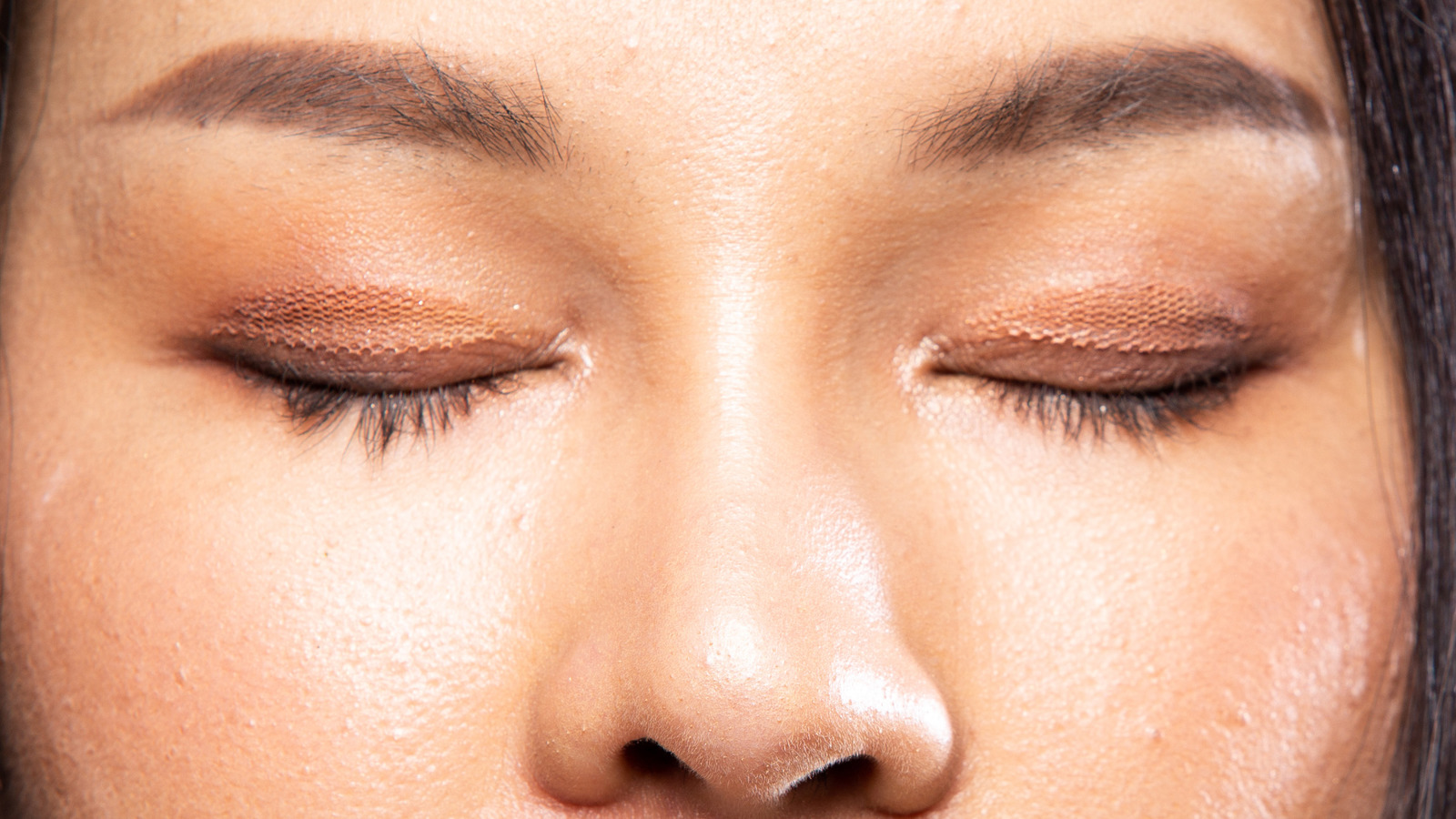 You've Been Using Eyelid Tape Wrong This Entire Time