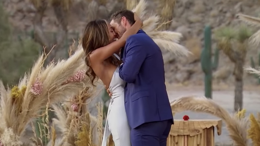 Zac and Tayshia kissing during proposal