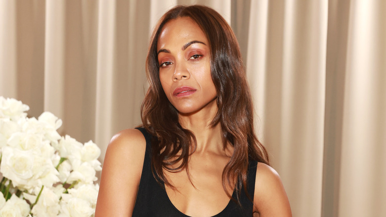 Zoe Saldana posing at Vogue event