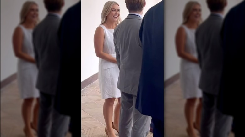 Karoline Leavitt wearing a white dress