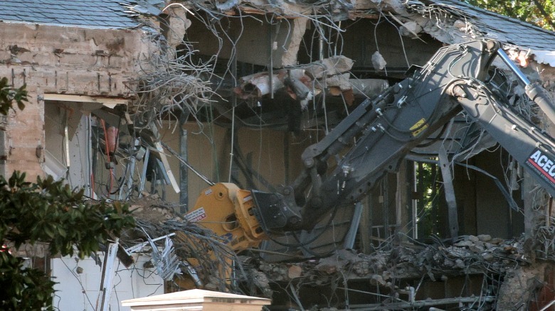 Workers demolish the White House in October 2025.