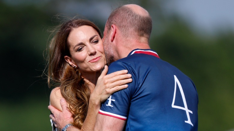 Prince William kissing Princess Catherine on the cheek