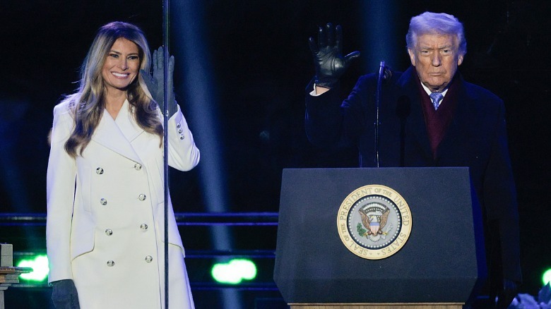 Melania Trump and Donald Trump waving