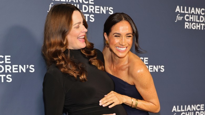 Kelly McKee Zajfen and Meghan Markle laughing