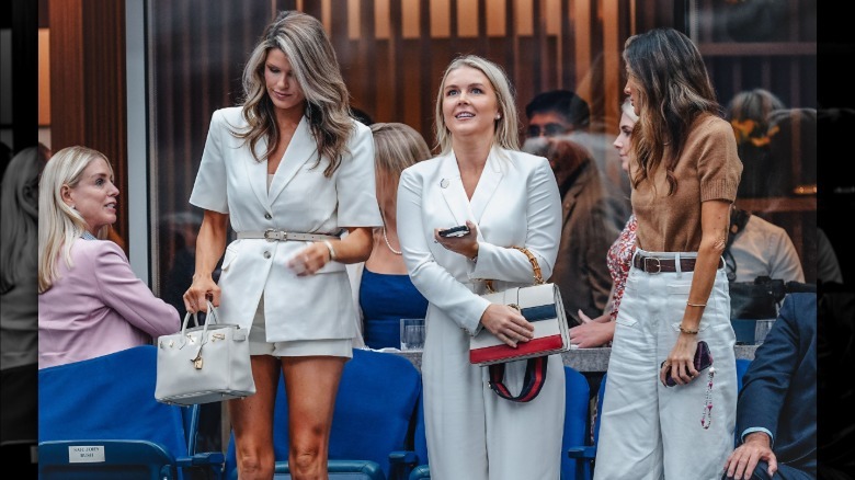 Lindsey Halligan and Karoline Leavitt wearing white