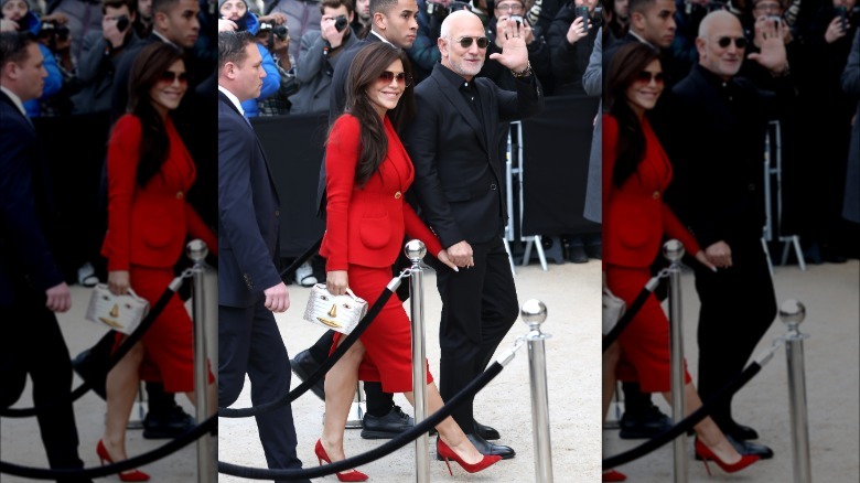 Lauren Sánchez Bezos and Jeff Bezos walking hand in hand