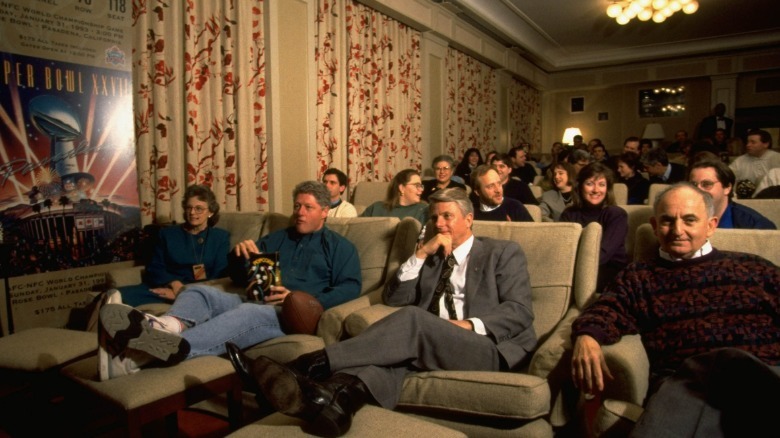 Bill Clinton watching the Super Bowl in the White House Family Theater
