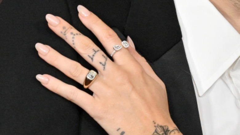 Close-up of Miley Cyrus's rings