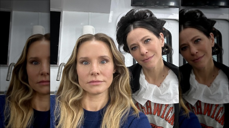 Kristen Bell posing alongside Jackie Tohn behind the scenes on the set of