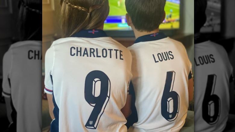 Prince Louis and Princess Charlotte in football jerseys
