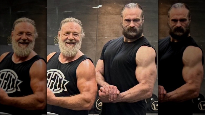 Russell Crowe and Drew McIntyre flexing their biceps
