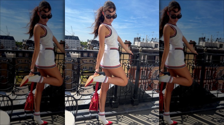 Ashtin Earle wearing a white outfit to Wimbledon