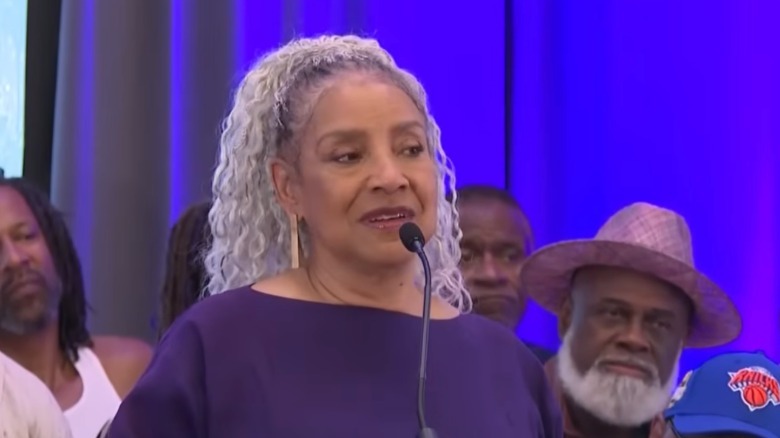 Phylicia Rashad speaking into a microphone