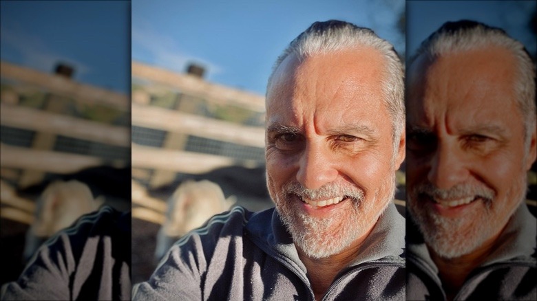 Maurice Benard smiling with gray hair and beard