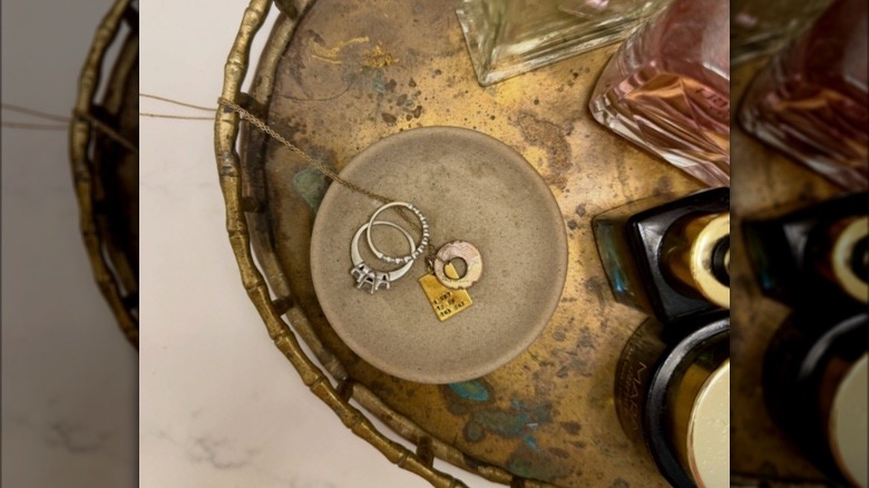 Jewelry placed in ring dish