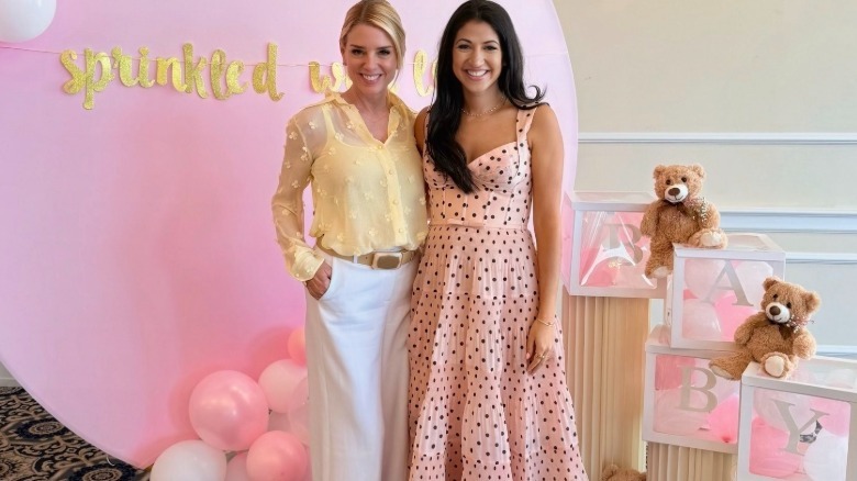 Pam Bondi in yellow top and white pants