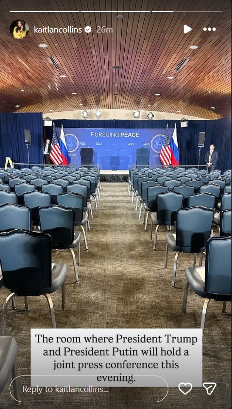 Many empty chairs in a press briefing room
