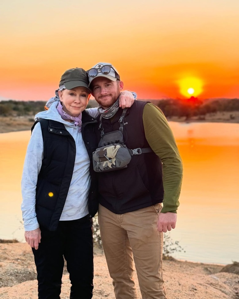 Reba McEntire hugs son Shelby Blackstock during a sunset