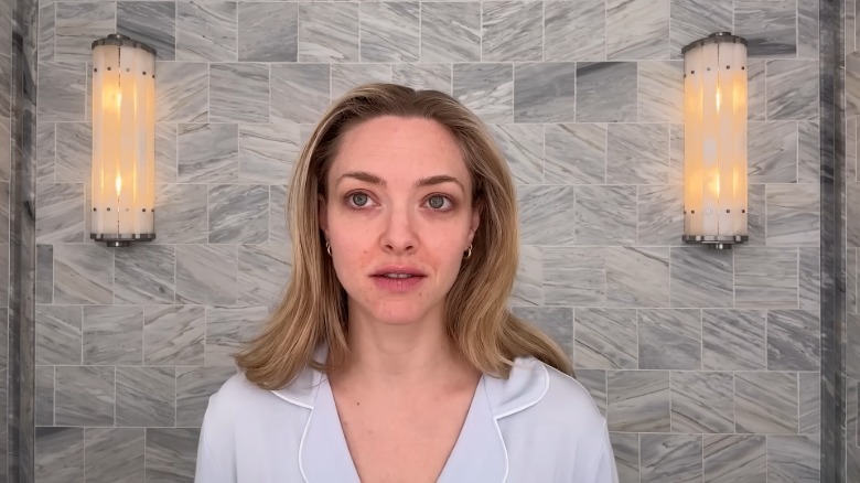 Amanda Seyfried makeup-free wearing blue pajamas
