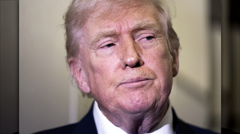 Donald Trump without makeup looking to the side