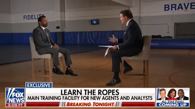 Kash Patel and Brett Baier sitting and talking together