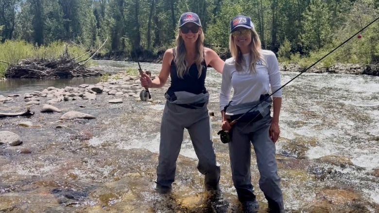 Ali Larter fishing with someone in Idaho
