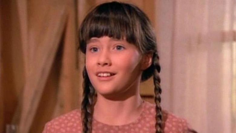 Shannen Doherty smiling in a scene from 'Little House on the Prairie'