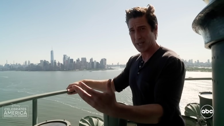 David Muir reporting from the torch of the Statue of Liberty