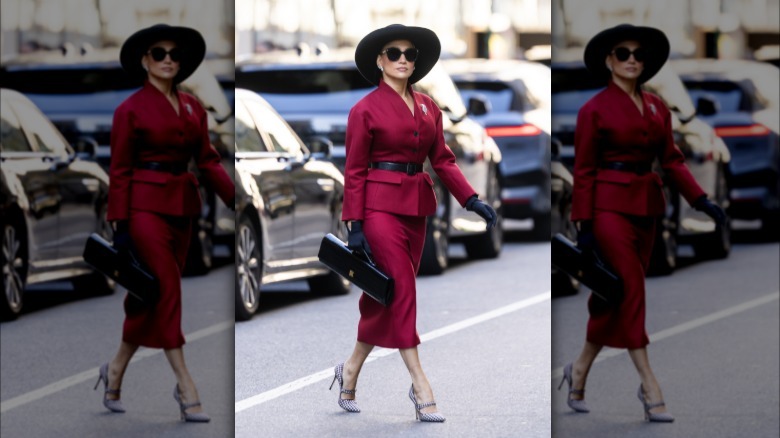 Jennifer Lopez looking mysterious with sunglasses and hat